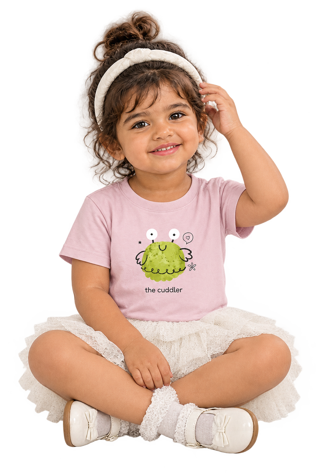 Anaya cross-legged close-up in The cuddler tee