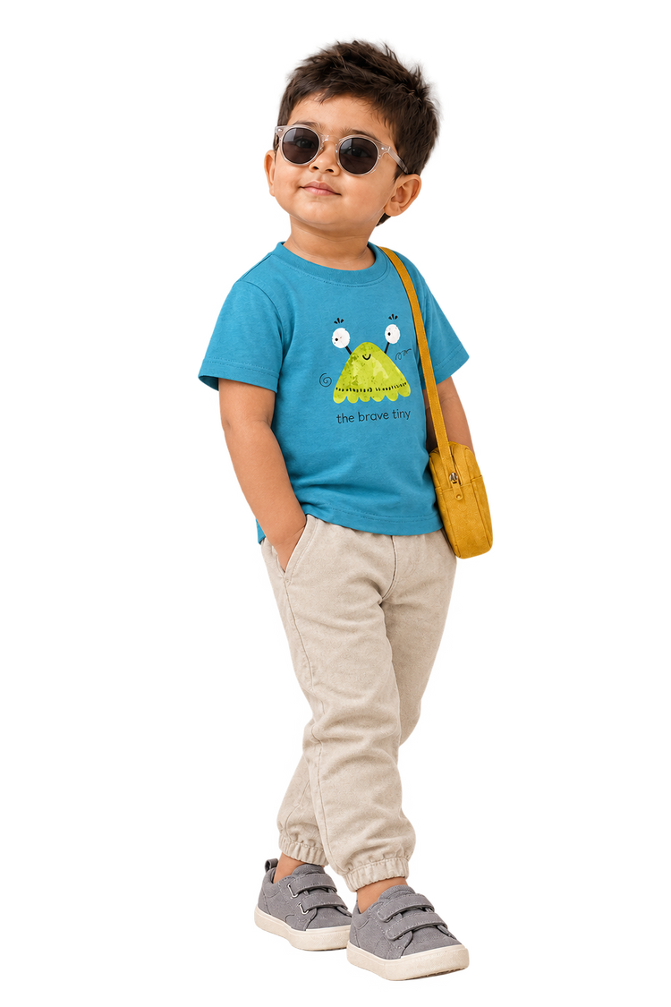 Kabir in the brave tiny tee, three-quarter