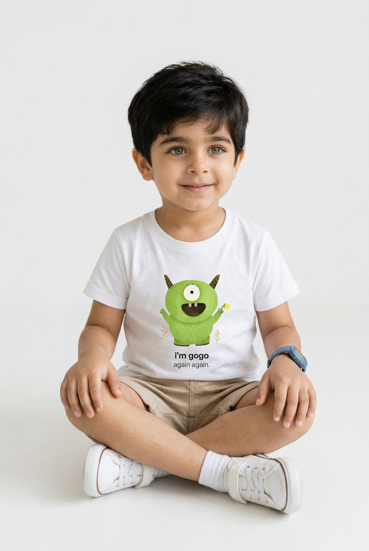 Vihan in Gogo tee, cross-legged pose